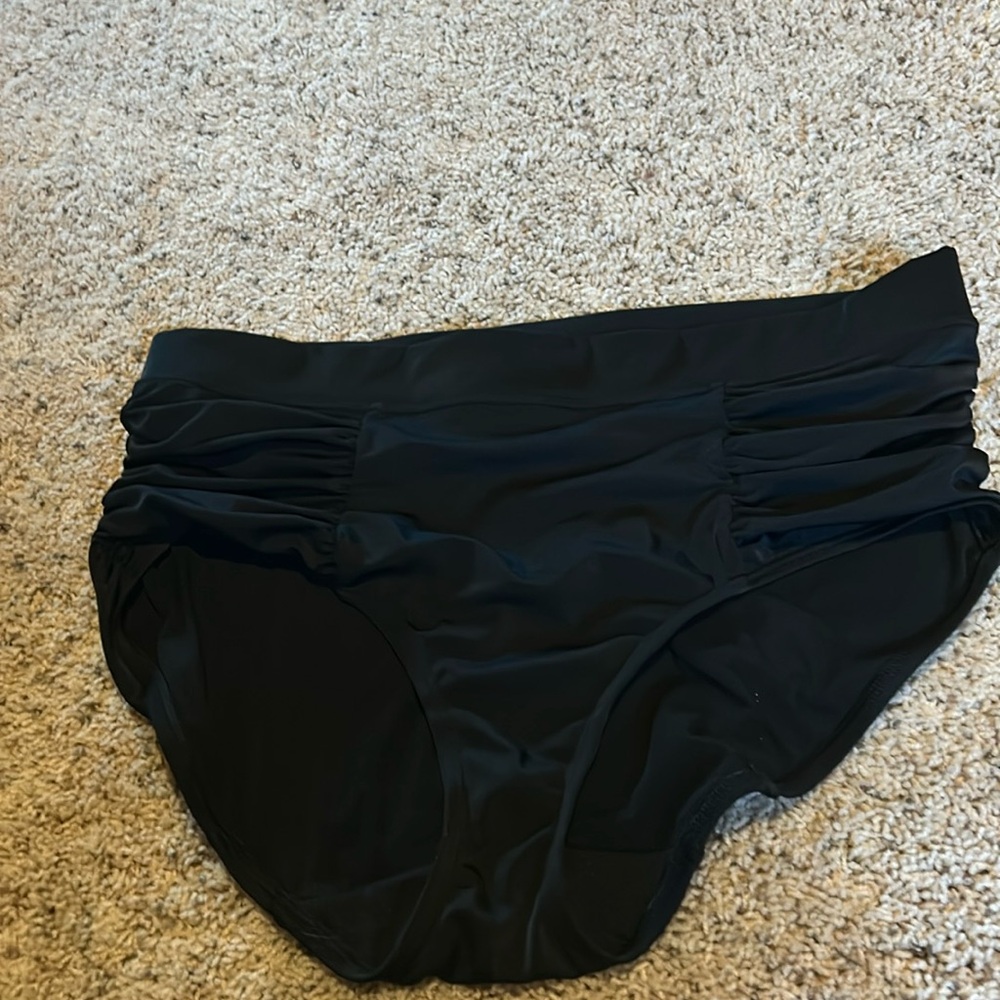 Lane Bryant ruched swim brief in black.
